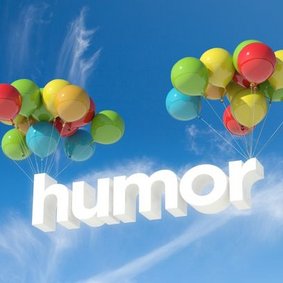 bunte luftballons mit schriftzug Humor